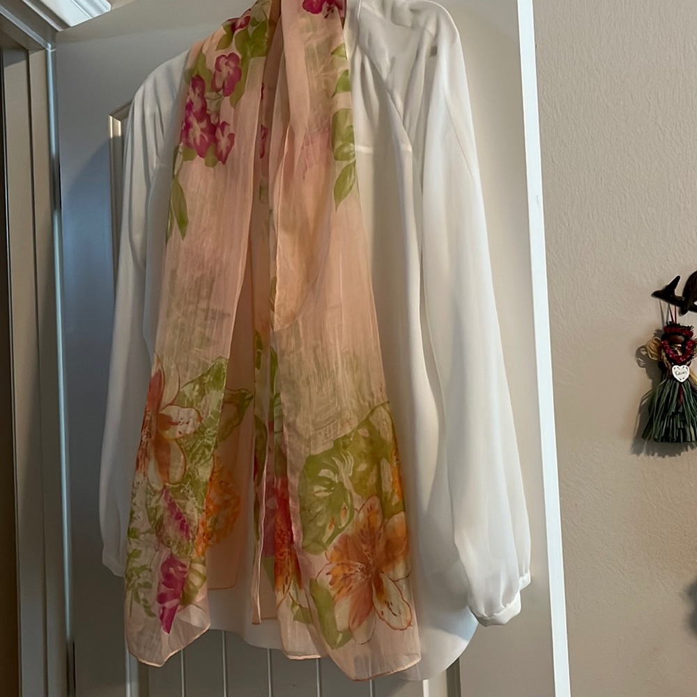 Sheer peach scarf with flowered design